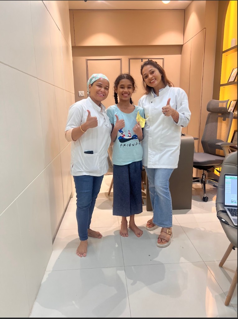 Patient testimonial photo at Dentaura